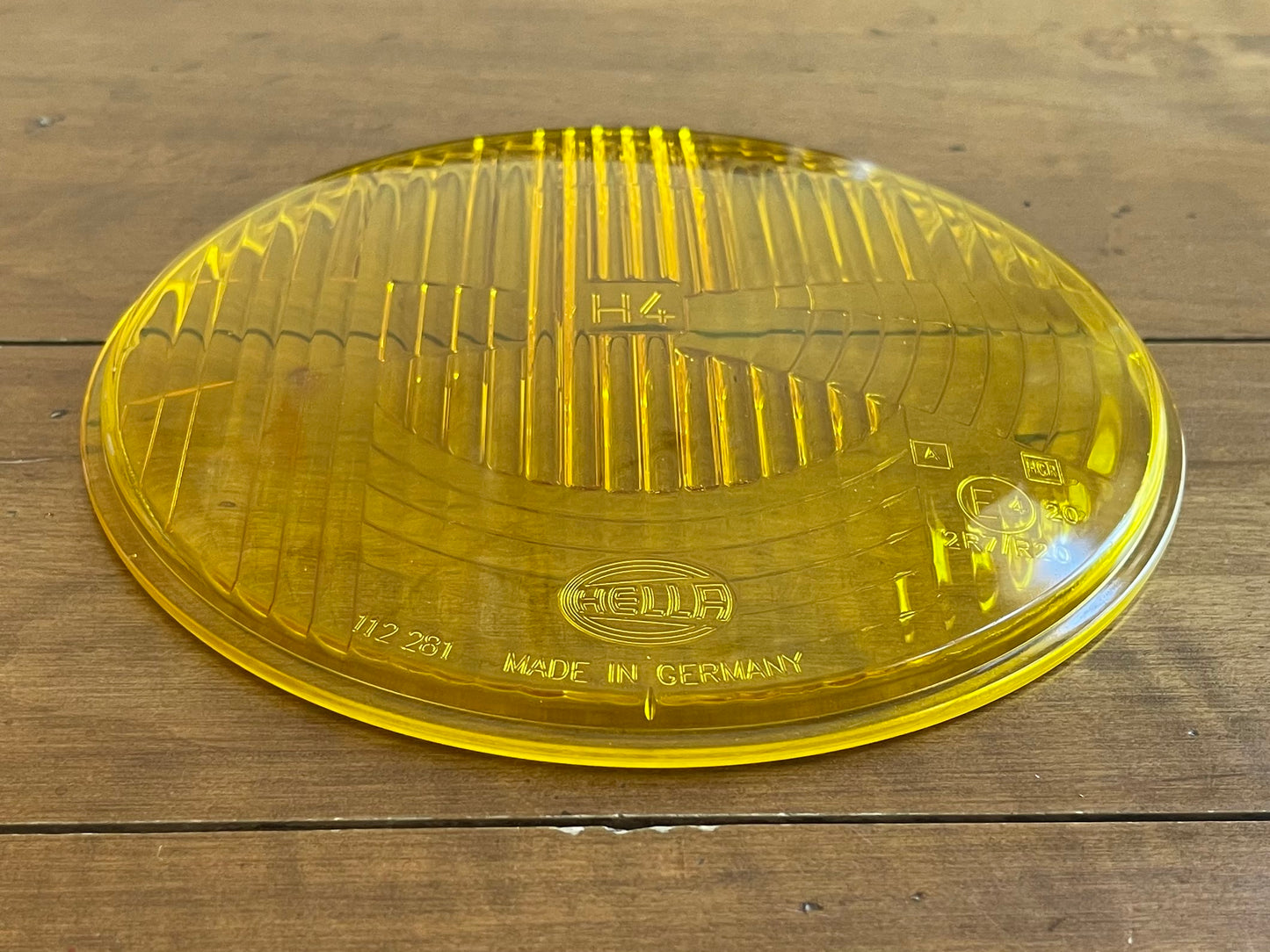 Hella yellow headlamp glass lense.